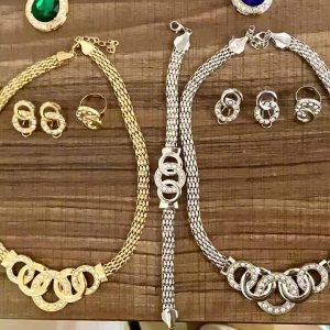 Trendy Luxury Gold Plated Crystal Rhinestone Jewelry Set for Women - 4 Piece Necklace Earrings Bracelet Ring Set