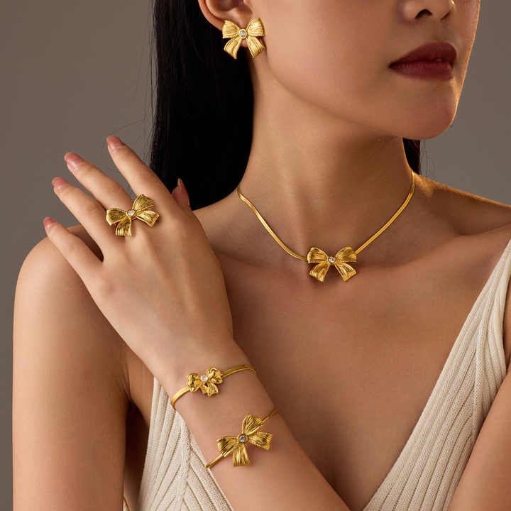 4pcs Bowknot Fashion Jewelry Set Women Stainless Steel Butterfly Zircon Blade Chain Necklace Earrings Bracelet Rings Set(JYS082)
