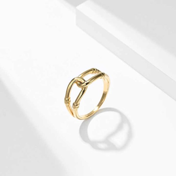 European and American wind ring buckle hollow simple ladies ring rope knot stainless steel personality proposal ring gift