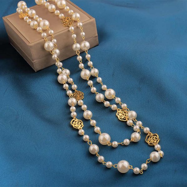 Wholesale High Quality Dainty Small Fragrant Pearl Hollow Out Flower Statement Women Sweater Chain Necklace