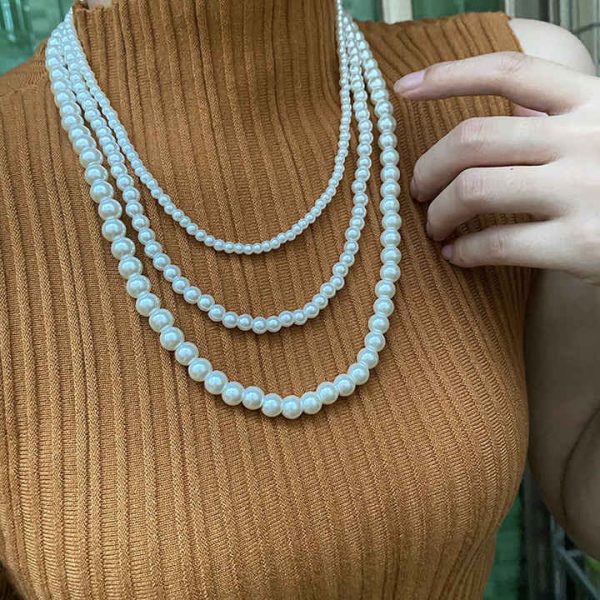 Fashion Women's Long-sweater Chain Necklace with Multi-layer Pearl Japanese and Korean New Religious Style Pendant Nature